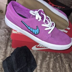 Nike Women's Purple Suede Sneakers with Teal Swoosh